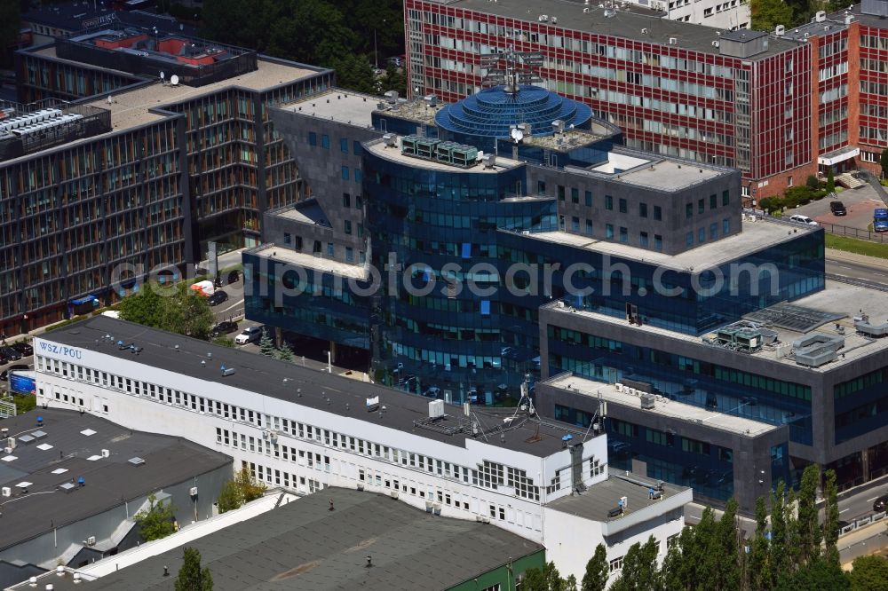 Warschau from above - The Zepter Business Centre in the Mokotow district in Warsaw in Poland. The eight story office building consists of two connected parts and is renowned for its glas facade and dome. Also characterised by its ship shape, it was designed by the architectural office Gader