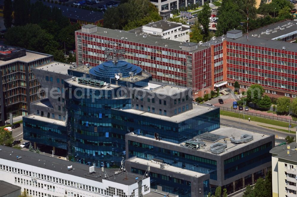 Warschau from the bird's eye view: The Zepter Business Centre in the Mokotow district in Warsaw in Poland. The eight story office building consists of two connected parts and is renowned for its glas facade and dome. Also characterised by its ship shape, it was designed by the architectural office Gader