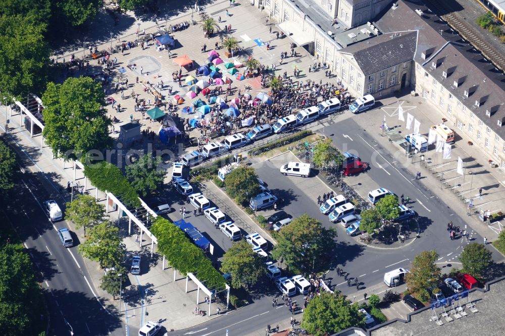 Göttingen from the bird's eye view: Demonstration of NPD on the station square in Goettingen in the state Lower Saxony