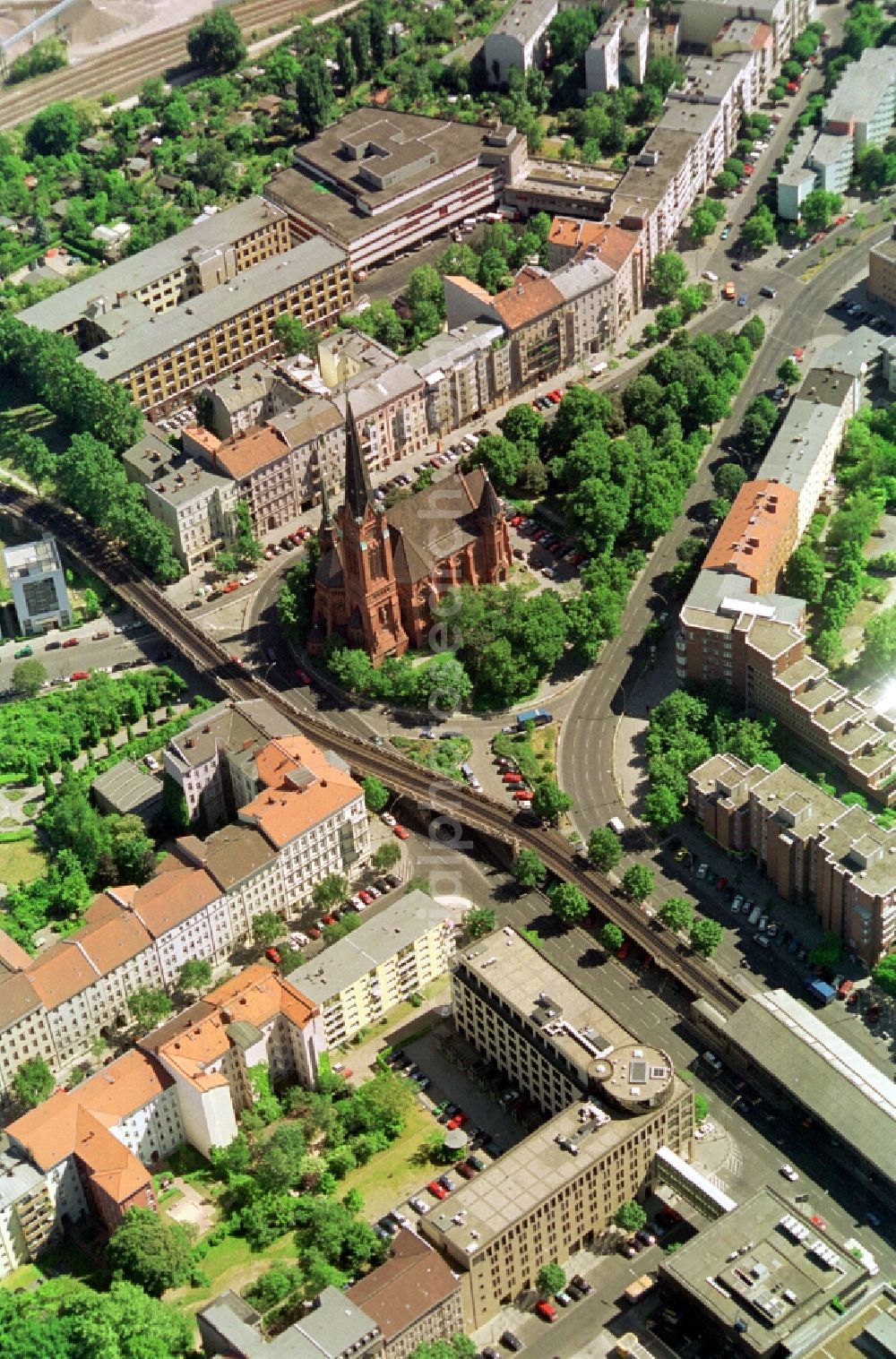 Berlin from the bird's eye view: View of the publice square Dennewitzer Platz with the Luther Church in Berlin-Schöneberg. The Neo-Gothic church near the subway station Buelowstrasse was built in the end of the 19th Century