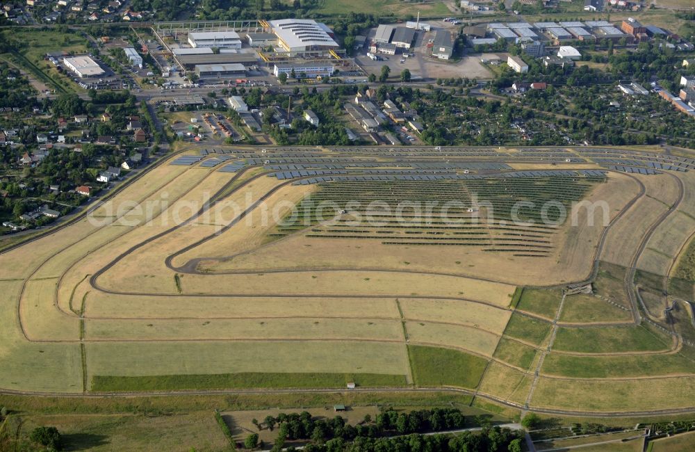 Magdeburg from above - View of the solar park in Magdeburg in Saxony-Anhalt. Under the direction of the WSB group, there was built the solar park within 5 months on the former domestic waste landfill Cracauer Anger, which was closed in 1998. The plant went into operation in December 2011