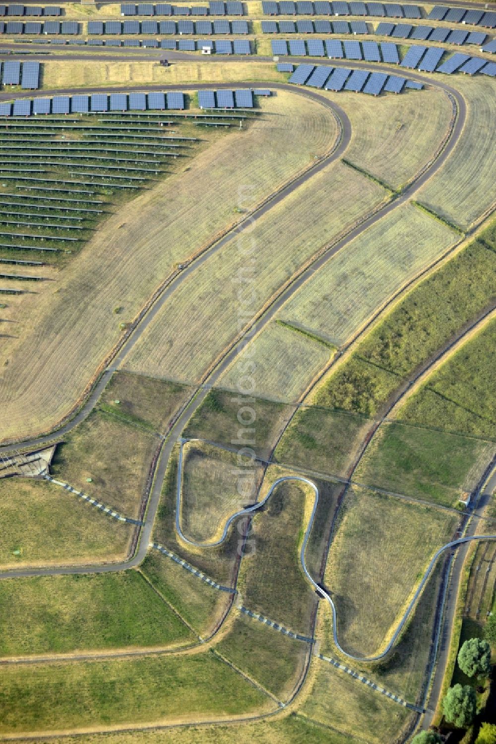 Aerial image Magdeburg - View of the solar park in Magdeburg in Saxony-Anhalt. Under the direction of the WSB group, there was built the solar park within 5 months on the former domestic waste landfill Cracauer Anger, which was closed in 1998. The plant went into operation in December 2011