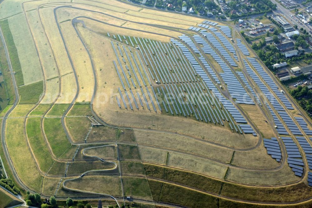 Aerial photograph Magdeburg - View of the solar park in Magdeburg in Saxony-Anhalt. Under the direction of the WSB group, there was built the solar park within 5 months on the former domestic waste landfill Cracauer Anger, which was closed in 1998. The plant went into operation in December 2011