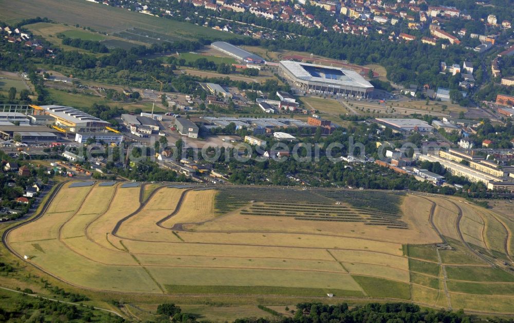 Magdeburg from the bird's eye view: View of the solar park in Magdeburg in Saxony-Anhalt. Under the direction of the WSB group, there was built the solar park within 5 months on the former domestic waste landfill Cracauer Anger, which was closed in 1998. The plant went into operation in December 2011