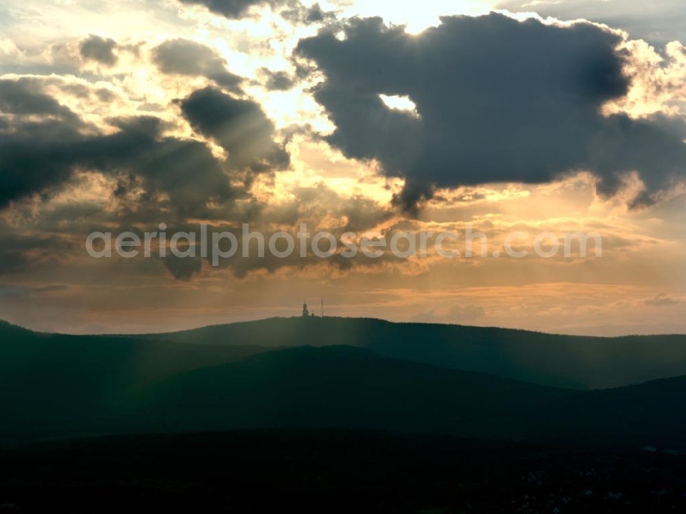 Schmitten from above - View of the mountain Grosser Feldberg in the evening sun, the highest mountain in the southwestern part of the Taunus mountains of Central Hesse. The mountain, whose top area is deforested, is a popular tourist destination