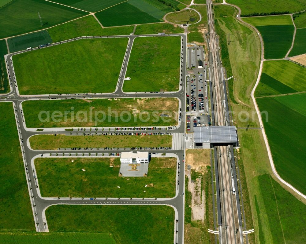 Aerial image Limburg an der Lahn - The train station Limburg South in Limburg an der Lahn in the state of Hessen. When the ICE fast train track of Cologne - Rhine was built, a dedicated ICE train station was purposely built in Limburg. It is located in the South of the city, enclosed by fields and has its own Park & Ride facilities