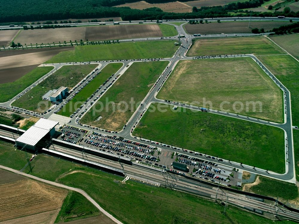 Aerial photograph Limburg an der Lahn - The train station Limburg South in Limburg an der Lahn in the state of Hessen. When the ICE fast train track of Cologne - Rhine was built, a dedicated ICE train station was purposely built in Limburg. It is located in the South of the city, enclosed by fields and has its own Park & Ride facilities