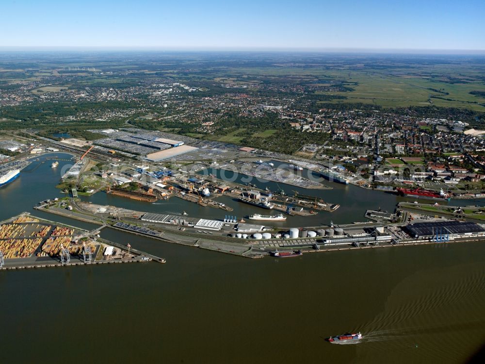 Bremerhaven from above - The overseas port in Bremerhaven in the state of Bremen. View of the container terminal compound. The harbour group belongs to the Bremischen Häfen. It is the fourth largest universal harbour in Europe. The three container wharfs in Bremerhaven accumulate to one of the biggest container shipping sites in the world