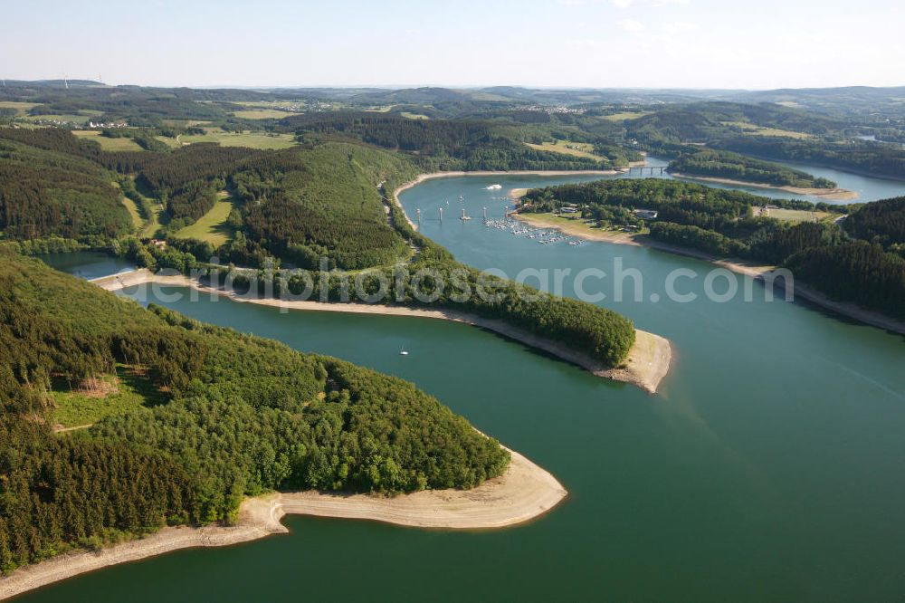 ATTENDORN from the bird's eye view: Der Biggesee (auch Biggetalsperre) - ein Stausee im Kreis Olpe in Nordrhein-Westfalen. Der Staudamm dient der Regulierung von Bigge, Lenne und Ruhr sowie der Wasserversorgung des Ruhrgebiets. The Bigge in North Rhine-Westphalia.