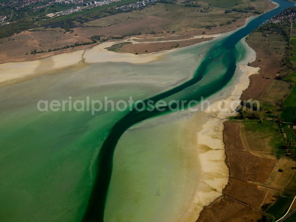 Aerial image Konstanz - The Lake Constance at the mouth of the river Rhine near Constance in the state of Baden-Württemberg. The varied coloration of the water of the river and the lake is distinguishable. This part of Lake Constance is the larger Obersee. The riverbank consists of gravel and sand, a natural barrier to the fields and acres