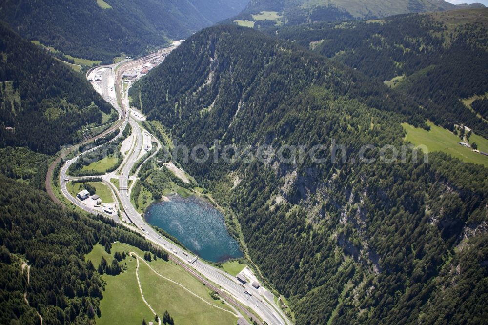 Aerial image Gries am Brenner - The Brennersee near the village Gries Brenner in Tirol in Oesterreich. The Brenner highway is between the mountains of the Alps. It goes from Germany to Italy straight through Austria