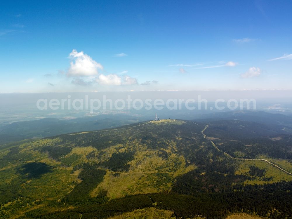 Aerial image Wernigerode - The Brocken is the highest mountain in northern Germany and the low mountain range Harz. It rises near Wernigerode in the Harz in Saxony-Anhalt. The mountain and its surroundings are part of the Harz National Park. From the fragments, one of Germany's most popular attractions, you can look in good visibility conditions, to the Big Island mountain in Thuringia, in the Köterberg Weserbergland and Peter Berg north of Halle an der Saale. Top of the mountain runs a narrow-track chunks