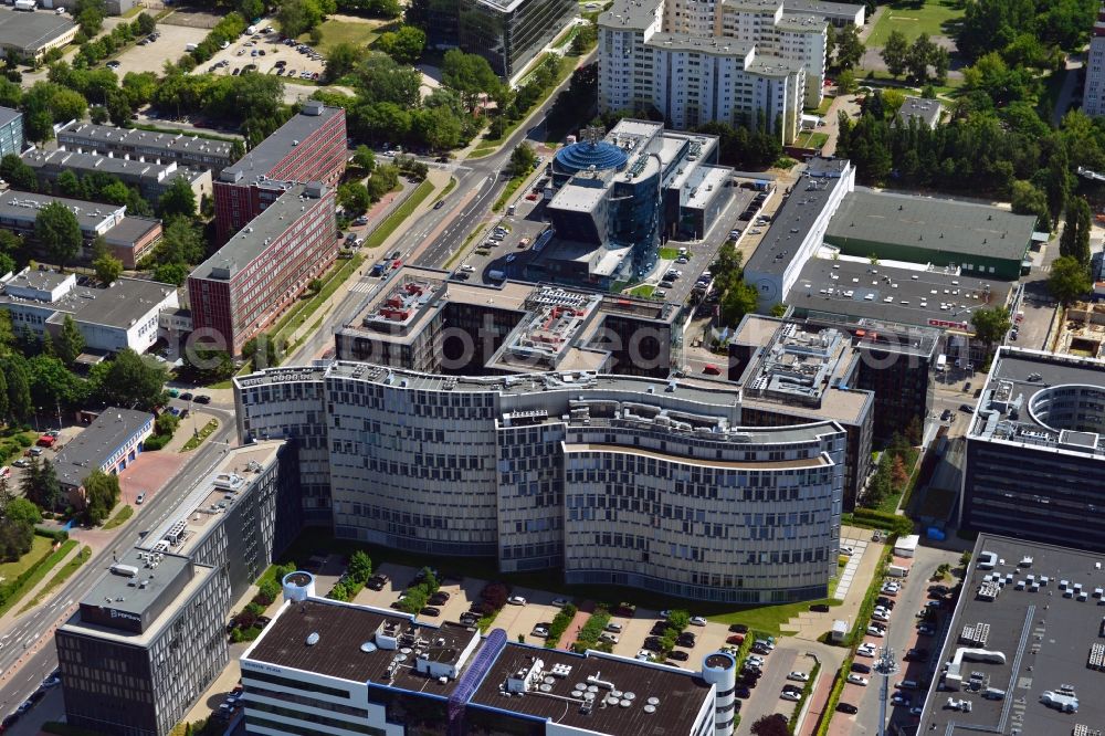 Aerial image Warschau - The office complex Horizon Plaza in the Mokotow district of Warsaw in Poland. The complex consists of two buildings - a low rise which fits into the surrounding area of the business district and which is located on Domaniewska Street - and a taller one which is known for its round shape, rippling glas facade and its roof terraces. It was designed by JSK Architects