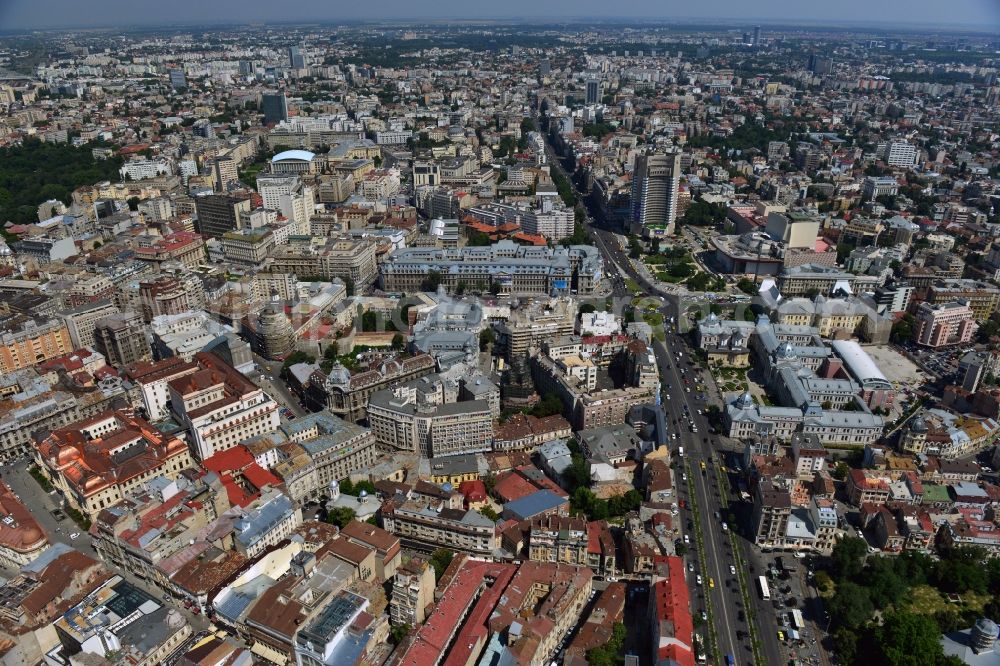 Aerial image Bukarest - The Bulevardul Ion C. Bratianu and the University Square in downtown Bucharest in Romania. View from the South towards the square. On the square there are the University of Bucharest main building, the National Theatre and the Hospital Coltea on the East side of the Boulevard. The hospital is the oldest of the city, completed in 1703. It is also home to a church