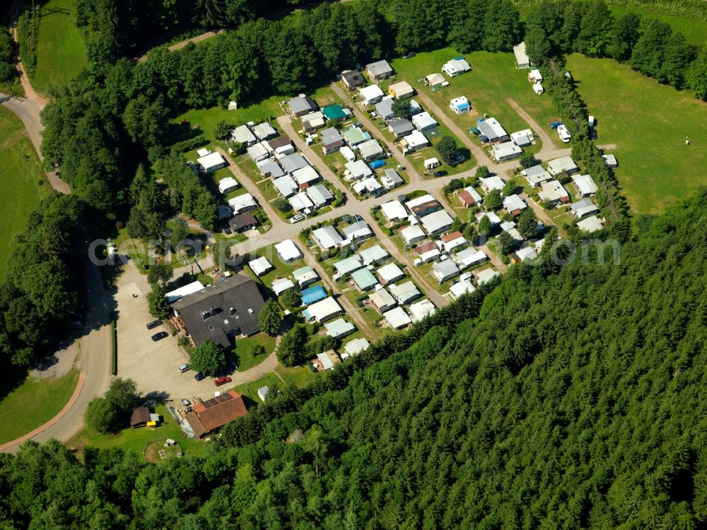 Ühlingen-Birkendorf from above - The Schlüchtal Camping site in the borough of Ühlingen-Birkendorf in the state of Baden-Württemberg. The camping site is located in a valley amidst the woods of the Black Forest in the North of the borough. On site there is also a cafe and restaurant