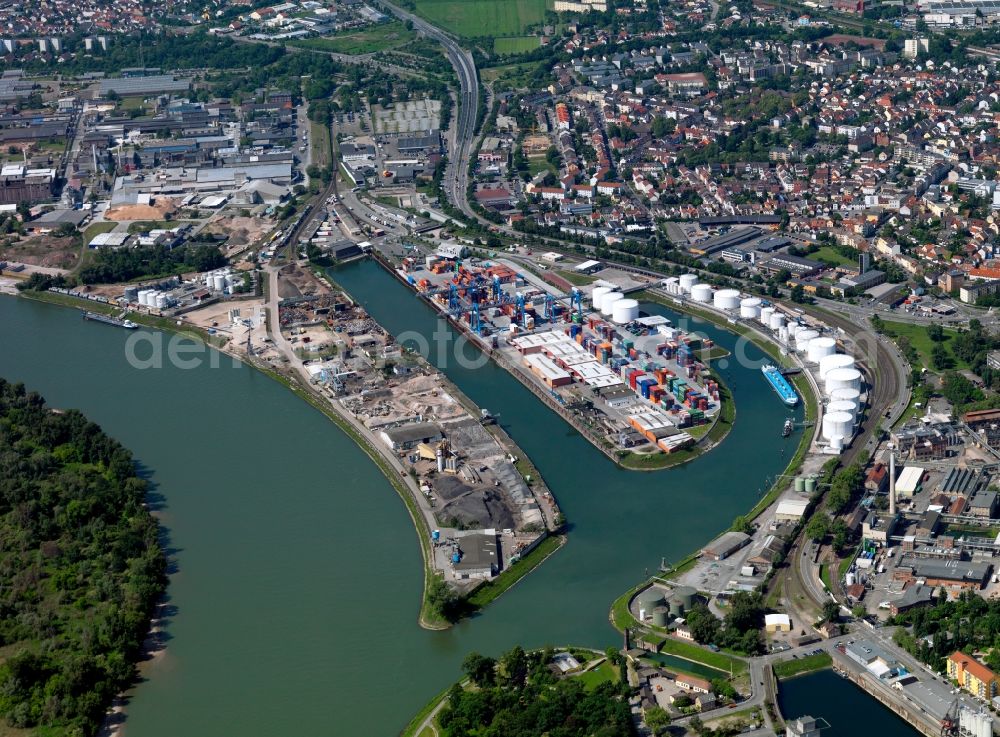 Ludwigshafen from above - The container terminal in Ludwigshafen on Rhine in the state of Rhineland-Palatinate. The terminal is run by the Triport GmbH and is mainly used for transportation and logisitics between the river port and the mainland. The terminal connects ships, trains and roads. Mainly cranse and forklifts are used for cargo handling