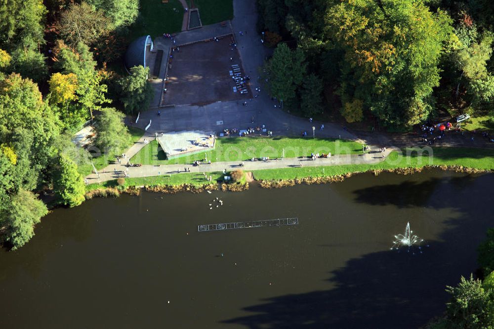 Saarbrücken from the bird's eye view: The german - french garden was opened in 1960 as a symbol of the friendship of the two countries. It is measuring 50 hectare and thus it is the largest park area of Saarbrücken. In 2001 it was declared a historic monument. The garden serves as an area for recreation and venue