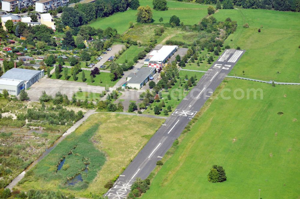 Frankfurt from above - View of the former airfield in the district of Frankfurt Bonames. On the grounds of the former U.S. military airfield, the landscape architects Mark Gnüchtel and Roland Nagies created a nature and recreation area, which is part of the green belt of Frankfurt