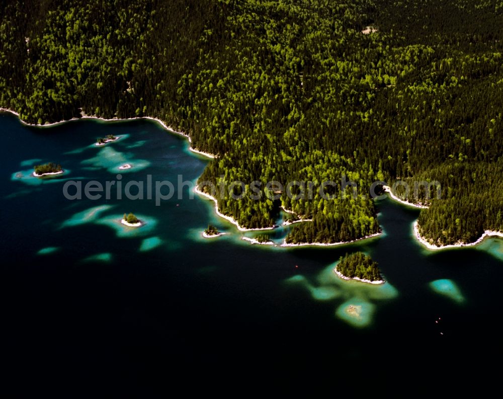 Aerial image Grainau - The lake Eibsee in the community of Grainau in the state of Bavaria. The lake is - due to its location below Zugspitze and its clear, green water - considered one of the most beautiful lakes in the Bavarian Alps. It is Wolfgang Gerberely owned and renowned as fishing spot