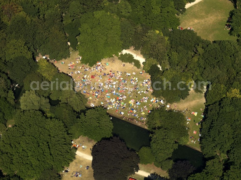 Aerial photograph München - The leisure area Englischer Garten (English Garden) in Munich in the state of Bavaria. The popular greens and open spaces of the park are mainly used in summer and are administrated by the Bavarian Administration of castles, gardens and lakes. The English Garden is on of the largest inner city parks in the world