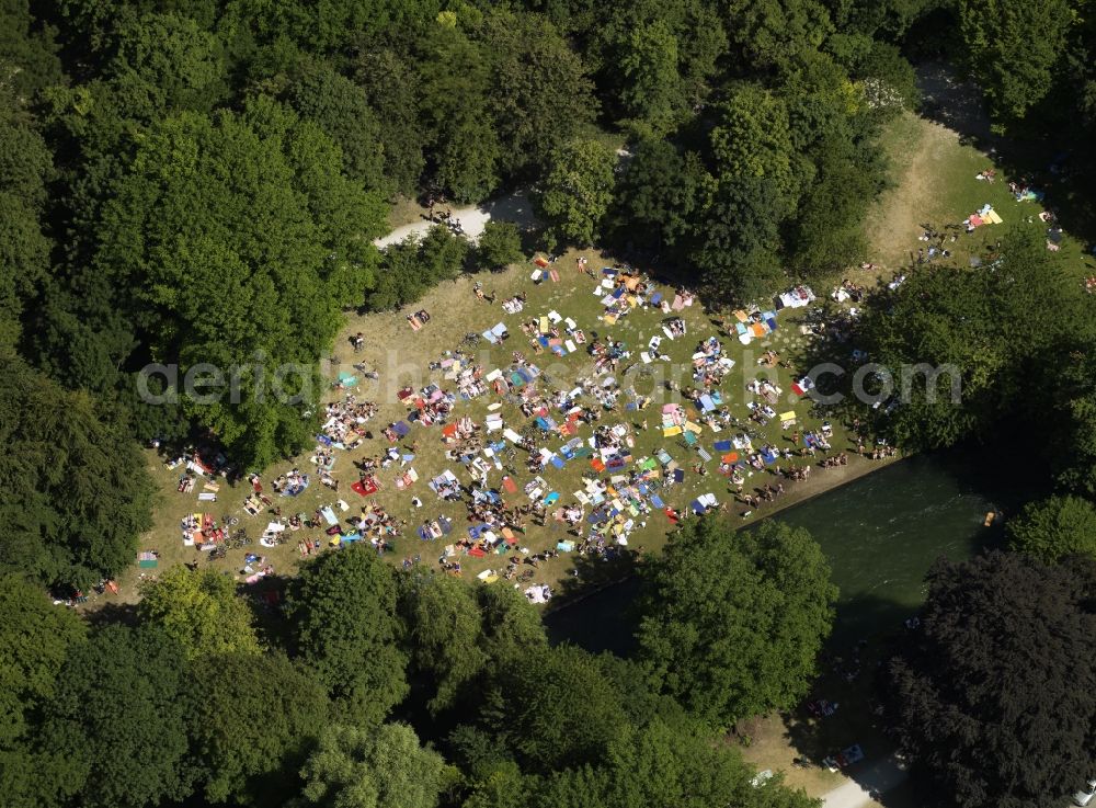 München from above - The leisure area Englischer Garten (English Garden) in Munich in the state of Bavaria. The popular greens and open spaces of the park are mainly used in summer and are administrated by the Bavarian Administration of castles, gardens and lakes. The English Garden is on of the largest inner city parks in the world