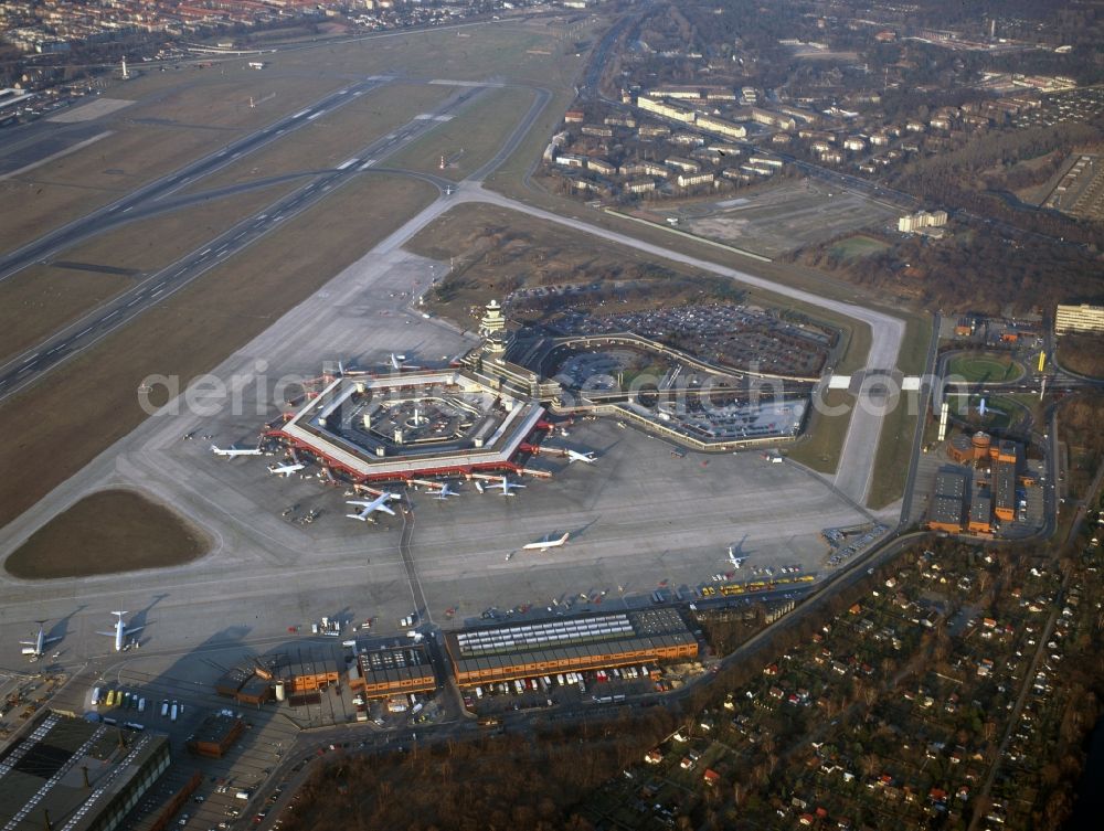 Berlin from above - The airport Berlin-Tegel Otto Lilienthal in Berlin. Here the main building (Terminal A and B) and the southern extensions (Terminal D and E)