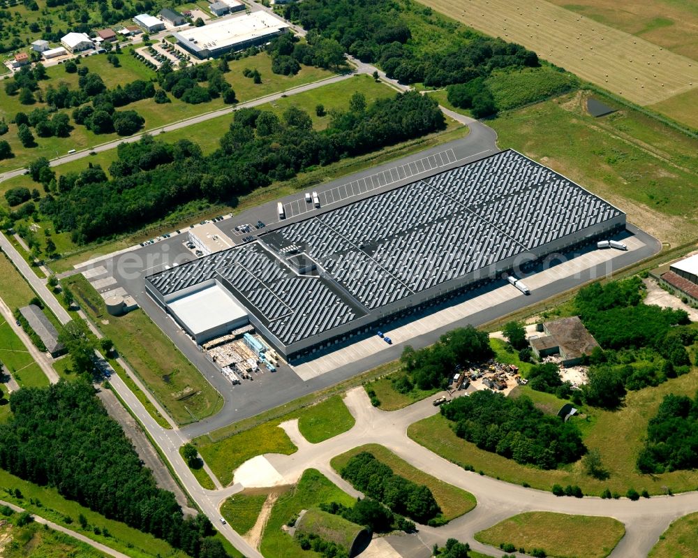 Bremgarten from the bird's eye view: The airfield and industrial area Bremgarten in the Breisgau region of the state of Baden-Württemberg. The area is a former military airfield. Today it is a nature preserve. View of a hall and logistic centre of the Lidl company