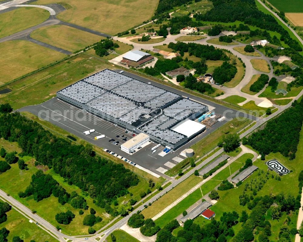 Aerial image Bremgarten - The airfield and industrial area Bremgarten in the Breisgau region of the state of Baden-Württemberg. The area is a former military airfield. Today it is a nature preserve. View of a hall and logistic centre of the Lidl company