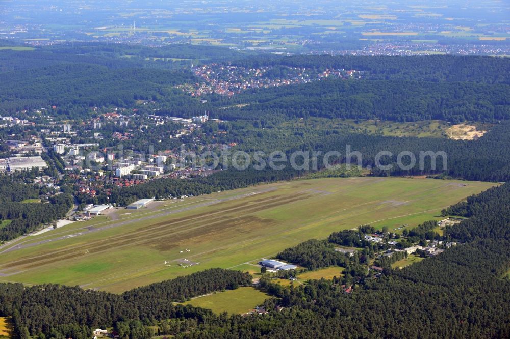 Aerial photograph Oerlinghausen - Oerlinghausen Airfield is a small airfield in the county district of Lippe in Ostwestfalen - Lippe in the state of North Rhine-Westphalia. It is one of the largest gliding centres. There are 3 runways accommodating motor planes, gliders, microlights and hot air balloons. It is operated by the Flugplatzgemeinschaft e.V