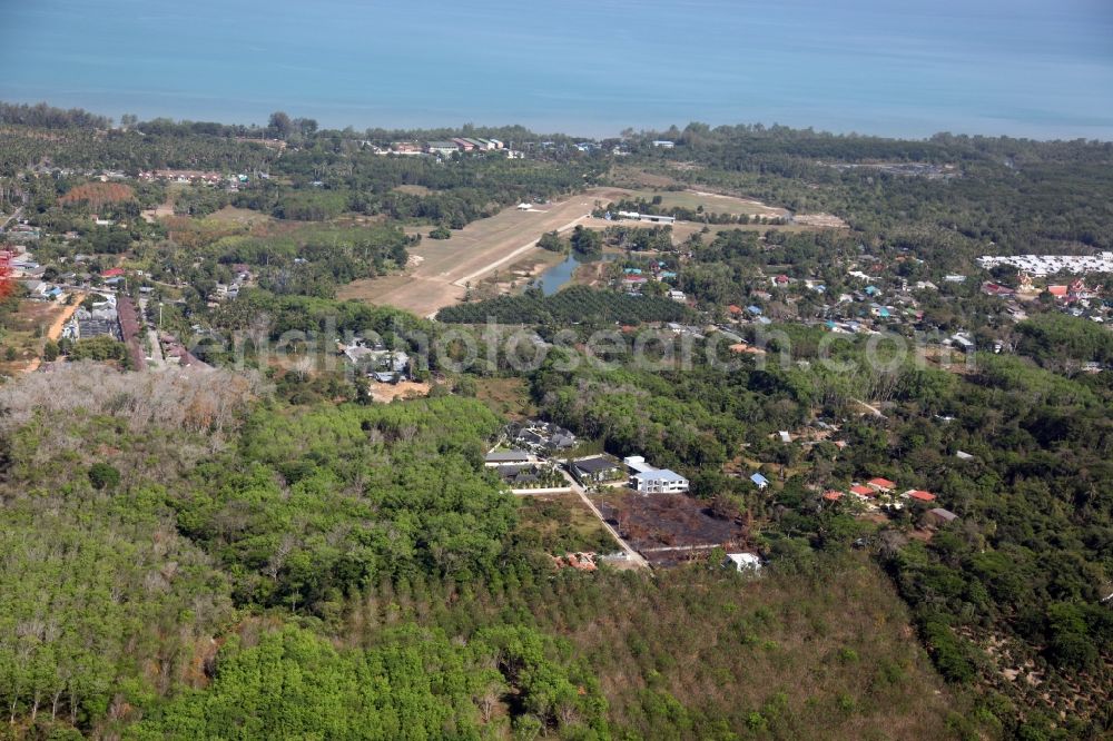 Pa Klok from above - The airfield Phuket Airpark in Pa Klok on the island of Phuket in Thailand is a sport airfield and is located on the eastern edge of the island and has a grass runway. ICEO Code: VTSW