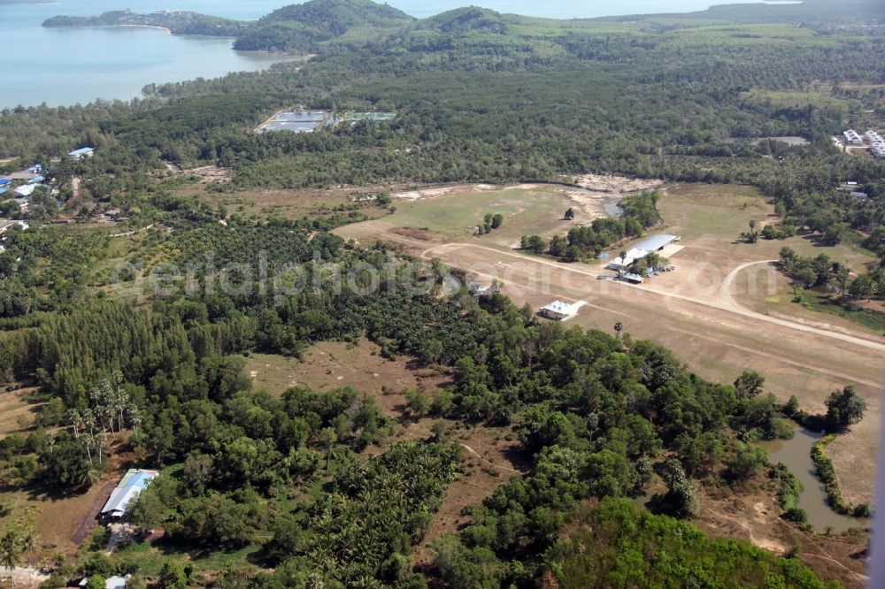 Aerial photograph Pa Klok - The airfield Phuket Airpark in Pa Klok on the island of Phuket in Thailand is a sport airfield and is located on the eastern edge of the island and has a grass runway. ICEO Code: VTSW