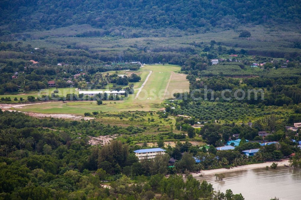 Aerial image Tambon Pa Klok - The airfield Phuket Airpark in Pa Klok on the island of Phuket in Thailand is a sport airfield and is located on the eastern edge of the island and has a grass runway. ICEO Code: VTSW