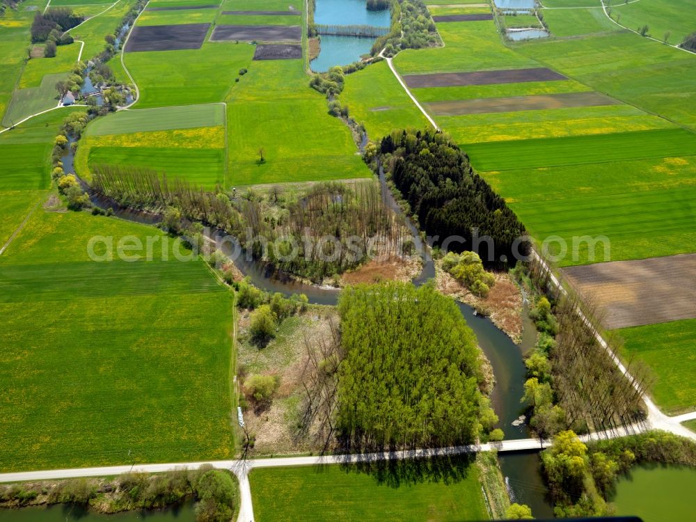 Aerial photograph Burtenbach - The river Mindel in the borough of Burtenbach in the state of Bavaria. The river splits into the Large Mindel and the Small Mindel and continues its run to the South, where the Small Mindel nurtures the pond Tiefgraben. The waters are surrounded by fields, meadows and forest