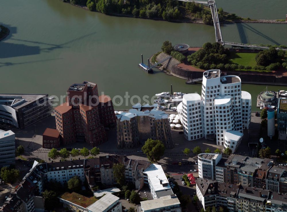 Düsseldorf from above - The New Zollhof is a group of buildings in the Düsseldorf media harbor. The buildings are known for their architecture by designer Frank Gehry Gehry. From 1996 to 1998, three deconstructivist buildings were erected. Striking is the curvature of the facade