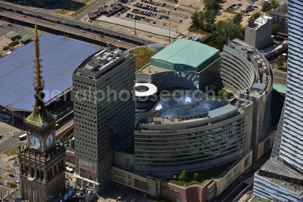 Warschau from the bird's eye view: The building complex Zlote Tarasy (Golden Terraces) in downtown Warsaw in Poland. The multi-functional complex of a shopping mall, office buildings and an entertainment area was opened in 2007. It is the most expensive real estate project in Warsaw and is located adjacent of the Cultural Palace. Its landmark is the elaborate glas roof of the shopping mall. Its current owners are Rodamco Europe B.V. and ING Real Estate Asset Management