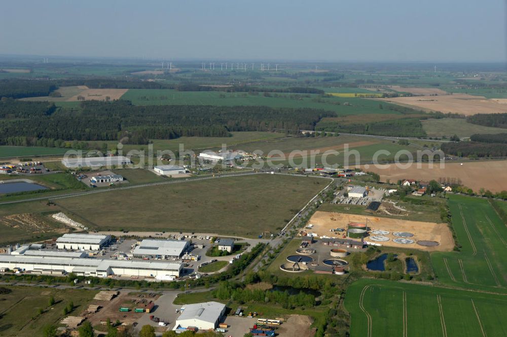 Heiligengrabe from the bird's eye view: Blick auf den Gewerbepark. Er befindet sich östlich von Heiligengrabe, direkt am Autobahndreieck Wittstock/ Dosse. Die Fläche ist Eigentum der Gemeinde und wird auch durch diese vermarktet. Kontakt: Gemeinde Heiligengrabe, Am Birkenwäldchen 1 a, Bürgermeister Herr Kippenhahn, Gewerbeamt Frau Düsterhöft, 16909 Heiligengrabe OT Heiligengrabe, Tel. 03 39 62 / 67 - 0, gemeinde@heiligengrabe.de