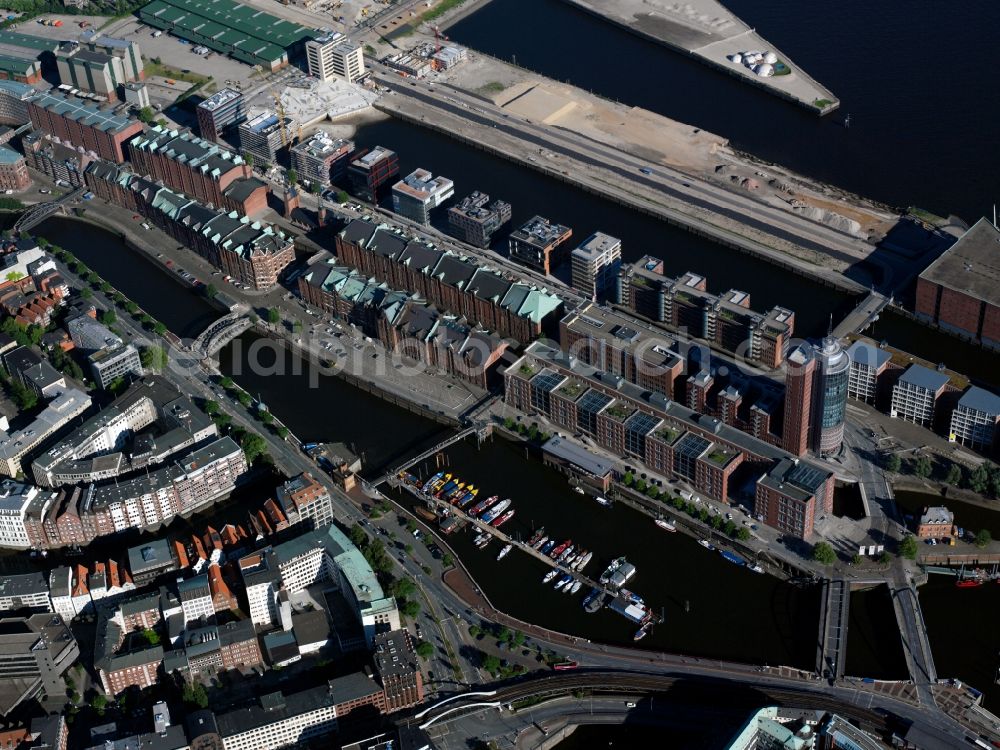 Aerial photograph Hamburg - The Port of Hamburg. It is located on the river Elbe and is the largest port in Germany and the second largest in Europe. View of residential and office buildings on Sandtorkai and the traditional shipping port