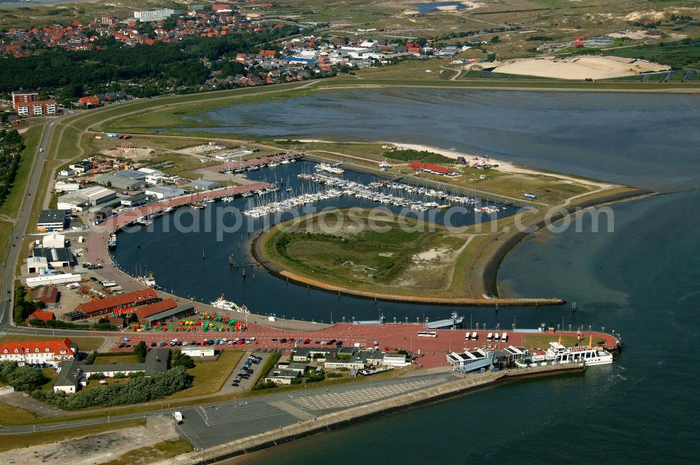 Norderney from the bird's eye view: Blick über den Hafen von Norderney. Der Hafen Norderney dient hauptsächlich als Fährhafen und Sportboothafen. View of the port of Norderney. The Port Norderney serves mainly as a ferry terminal and marina.