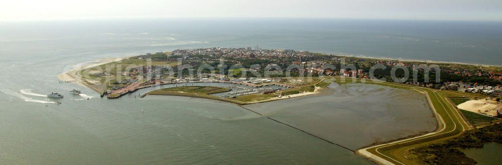 Norderney from the bird's eye view: Blick über den Hafen von Norderney. Der Hafen Norderney dient hauptsächlich als Fährhafen und Sportboothafen. View of the port of Norderney. The Port Norderney serves mainly as a ferry terminal and marina.