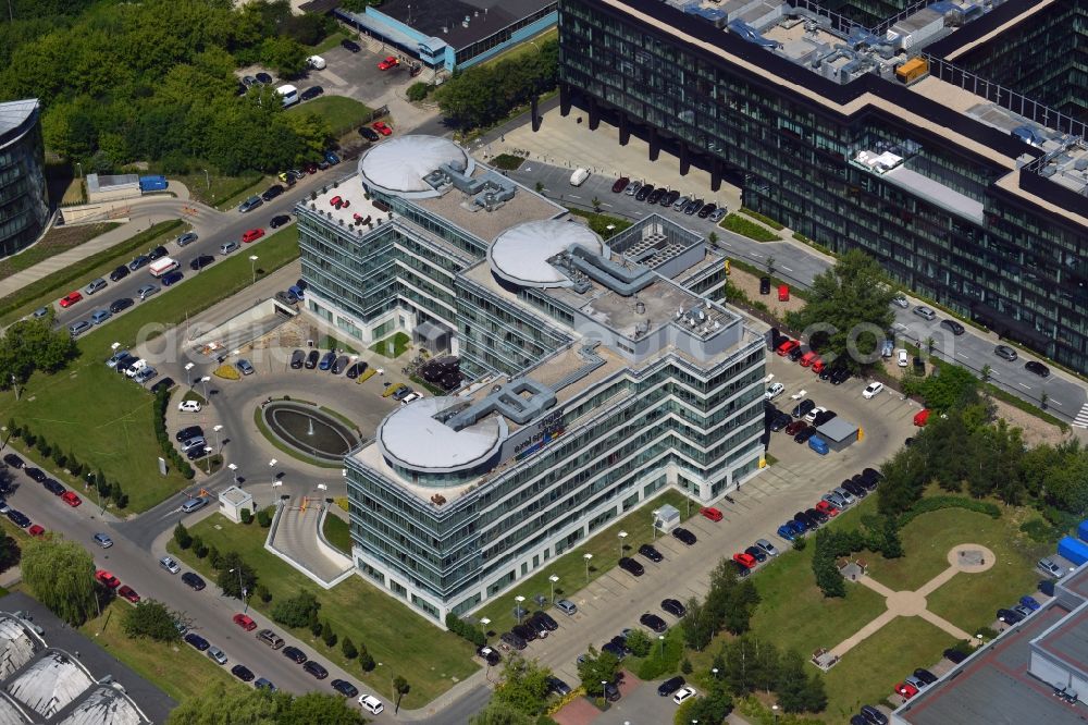 Aerial photograph Warschau - The headquarters of Ringier Axel Springer Media AG in the Mokotow district of Warsaw in Poland. The joint venture of the German and Swiss publishing houses has been created in 2010 and is located in the rectangular building in the Southwest of the district. The facility is surrounded by other office low rise buildings in the Sluzewiec part of the district