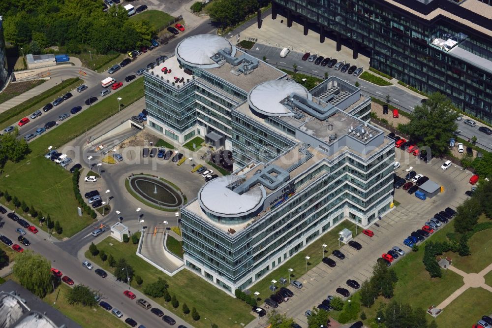 Warschau from above - The headquarters of Ringier Axel Springer Media AG in the Mokotow district of Warsaw in Poland. The joint venture of the German and Swiss publishing houses has been created in 2010 and is located in the rectangular building in the Southwest of the district. The facility is surrounded by other office low rise buildings in the Sluzewiec part of the district