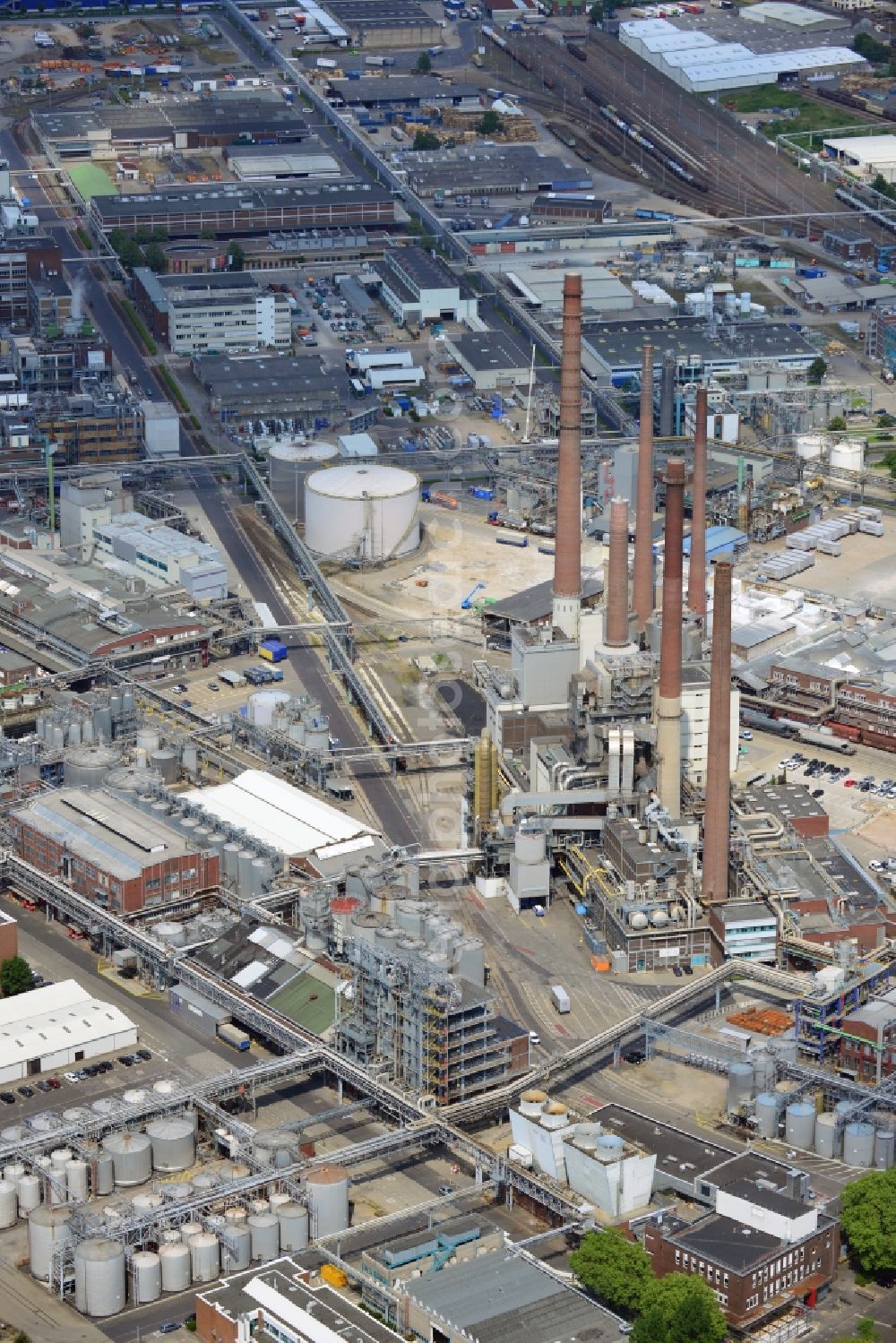 Aerial image Düsseldorf - The headquarters of the Henkel company in Düsseldorf-Holthausen in the city of Duesseldorf in the state of North Rhine-Westphalia. The location is in use since 1900. Today, it is the seat of the company. Henkel operates in Home Care, Personal Care and Adhesive Technologies worldwide. On site of the industrial compound there are also facilities of the Henkel daughter company Schwarzkopf&Henkel (cosmetics and hair care), as well as a part of the BASF Group, the BASF Personal Care and Nutrition (formerly Cognis GmbH)