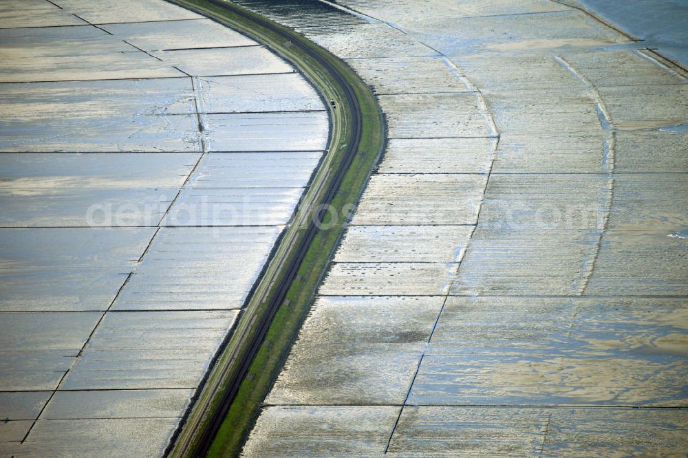 Aerial image MUNKMARSCH - The Hindenburg levee connects the Sylt island with the mainland of the state Schleswig-Holstein. It was opened in 1927 and is used for railroad cargo transport. During reclamation and diking the length changed from 11 km to 9 km throughout the decades