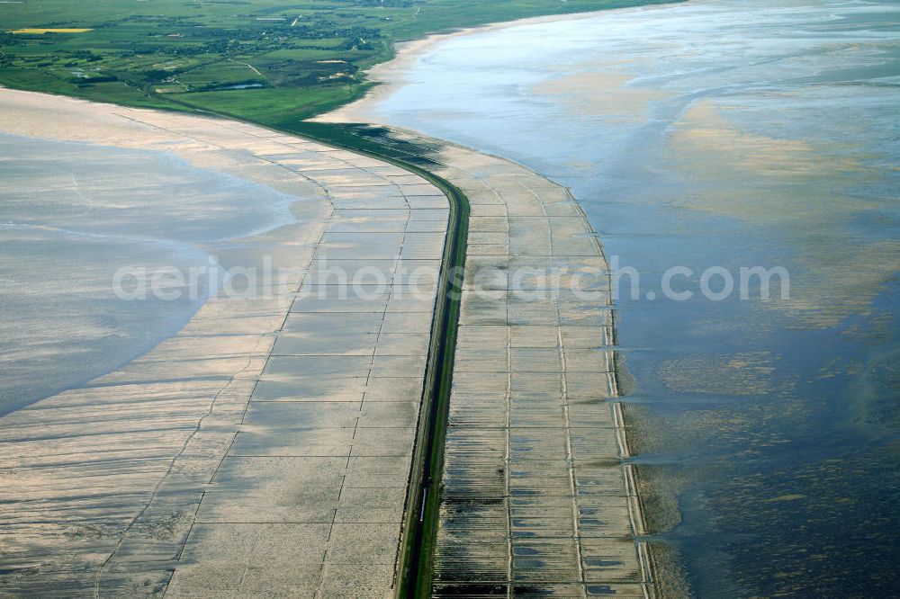 Aerial photograph MUNKMARSCH - The Hindenburg levee connects the Sylt island with the mainland of the state Schleswig-Holstein. It was opened in 1927 and is used for railroad cargo transport. During reclamation and diking the length changed from 11 km to 9 km throughout the decades