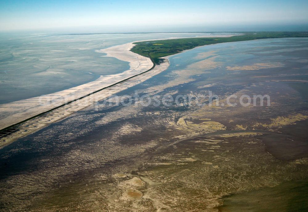 MUNKMARSCH from above - The Hindenburg levee connects the Sylt island with the mainland of the state Schleswig-Holstein. It was opened in 1927 and is used for railroad cargo transport. During reclamation and diking the length changed from 11 km to 9 km throughout the decades