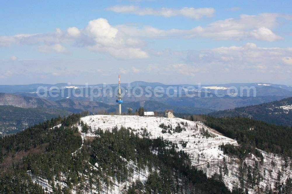 Aerial image Badenweiler - Cloud-imposed is the mountain Hochblauen near Badenweiler in the state of Baden-Wuerttemberg. Mountain hotel and television tower in winter landscape in tehe Black Forest