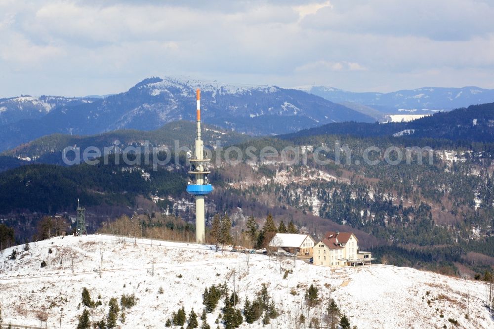 Aerial photograph Badenweiler - Cloud-imposed is the mountain Hochblauen near Badenweiler in the state of Baden-Wuerttemberg. Mountain hotel and television tower in winter landscape in tehe Black Forest