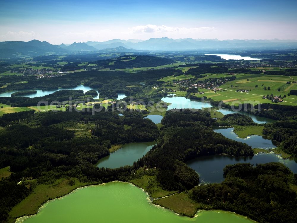 Aerial image Bad Endorf - Lake Langenbuergner See and the lake district of Eggstaett-Hemhof in Bad Endorf in the state of Bavaria. The lake is the largest of the region, which is one of the oldest nature preserve areas of Bavaria. It includes 18 lakes of various sizes and colours