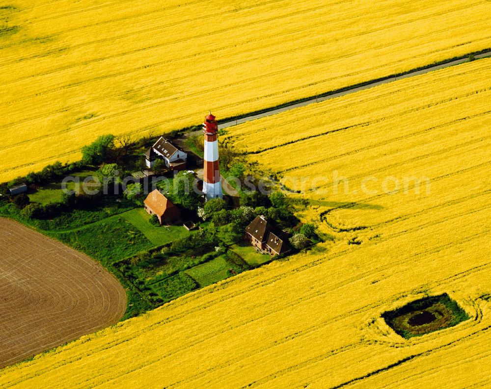 Flügge auf Fehmarn from above - The lighthouse of Flügge is located in the southwest of the island of Fehmarn. It is open to visitors and in use since 1916