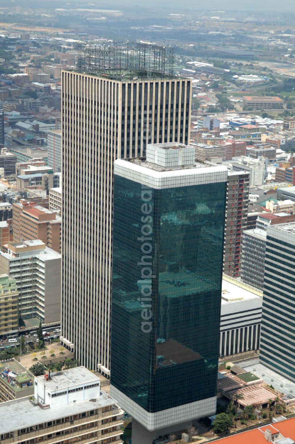 Aerial photograph JOHANNESBURG - The Marble Tower is a skyscraper in the central business district of Johannesburg and is used as an office building. The building in front is the former KwaDukuza eGoli Hotel. The building is currently not in use